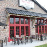 Synthetic Teak Outdoor Arm Chairs and Tables in Durango Barnwood